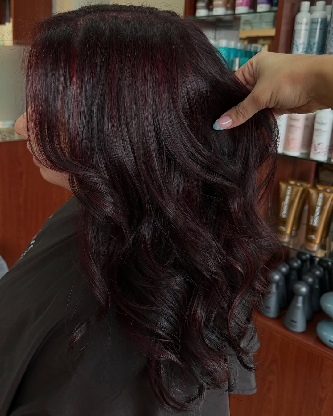Cherry cola balayage at The Cutting Edge Hair Design, Commack NY
