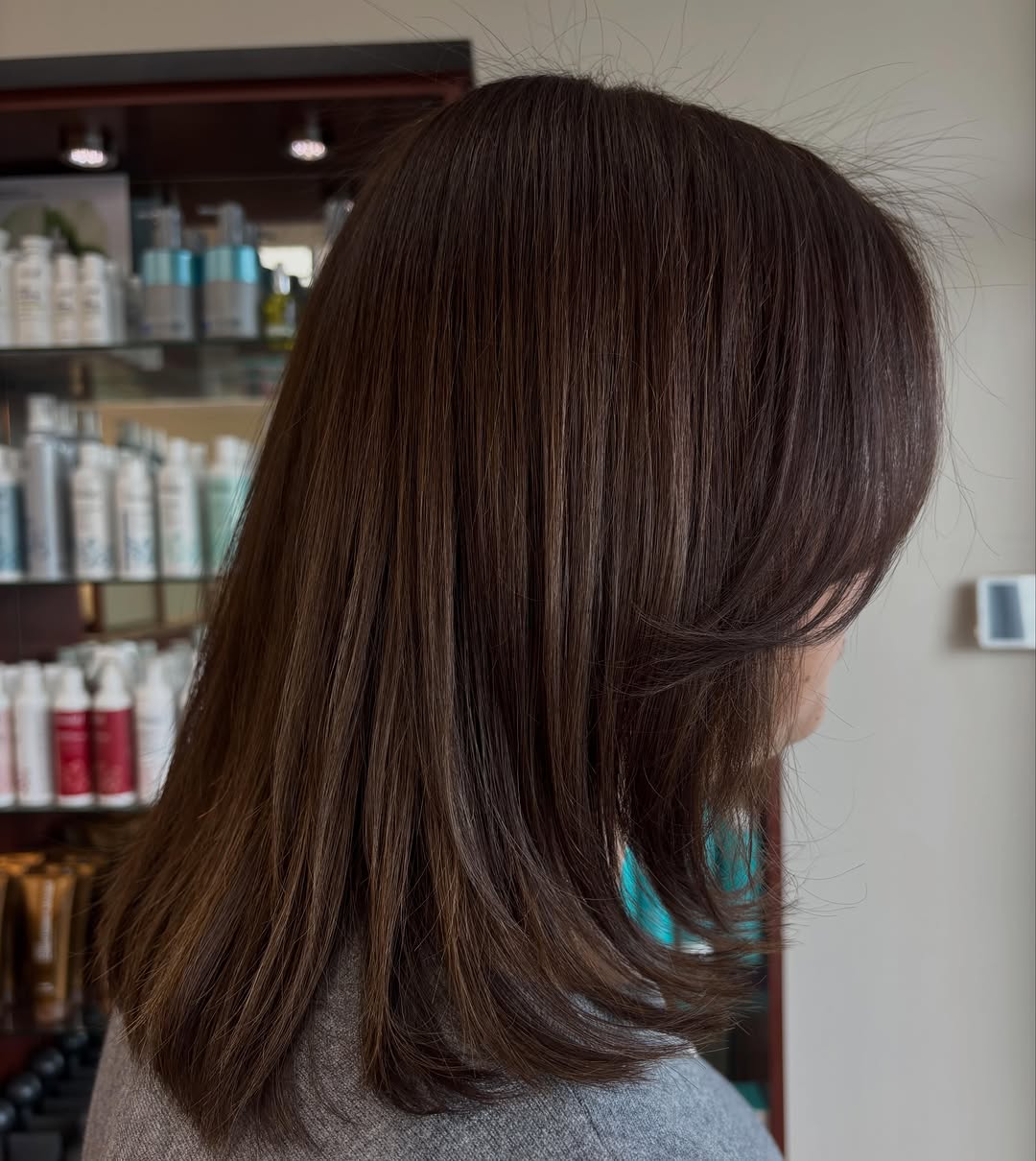 Keratin smoothing treatment frizzy to sleek hair at The Cutting Edge Hair Design, Commack NY