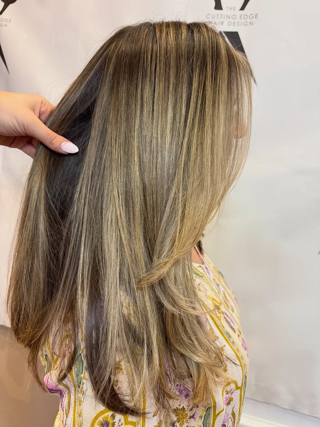 Lived-in blonde balayage at The Cutting Edge Hair Design, Commack NY